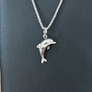 Silver Dolphin Pendant…Stamped Sterling…Thus is for the pendant only.